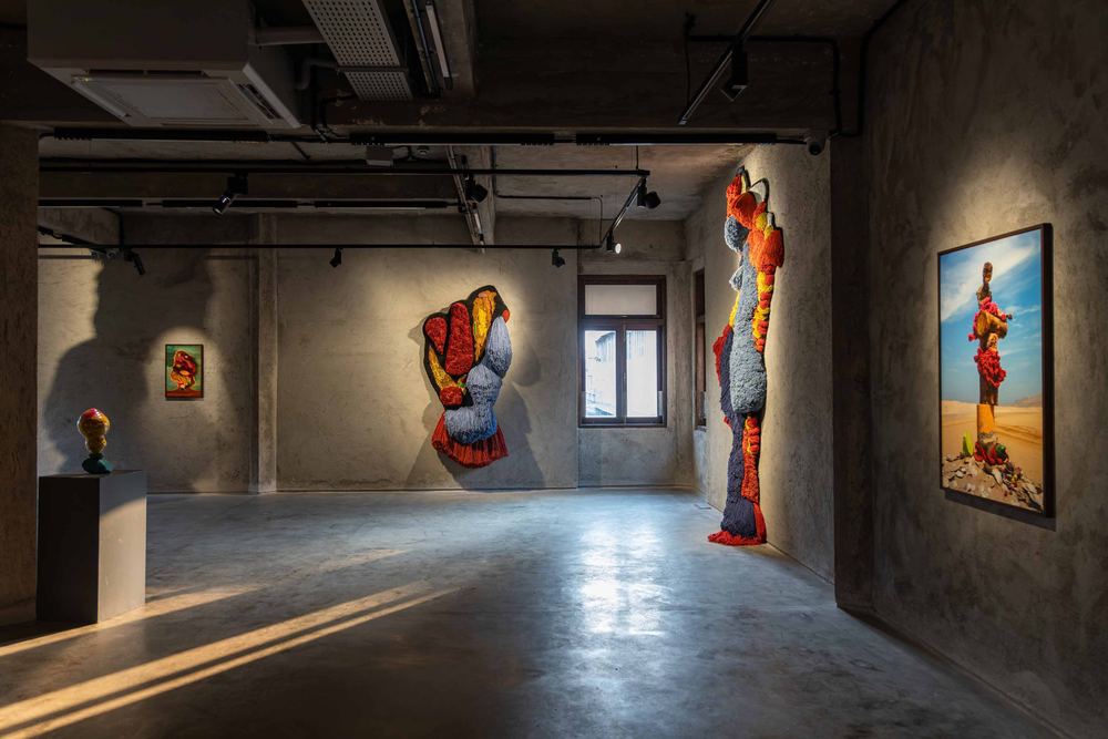 Gallery installation of textile works