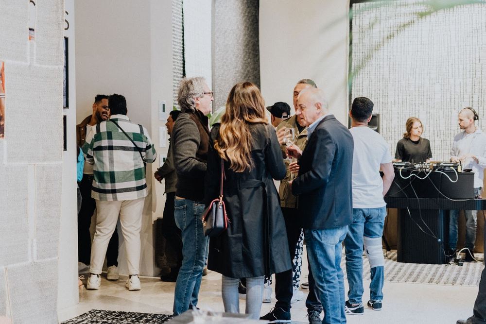 Guests in conversation at a showroom event